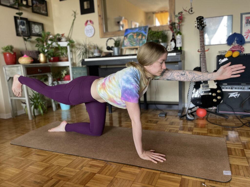 girl doing balancing pose during yoga