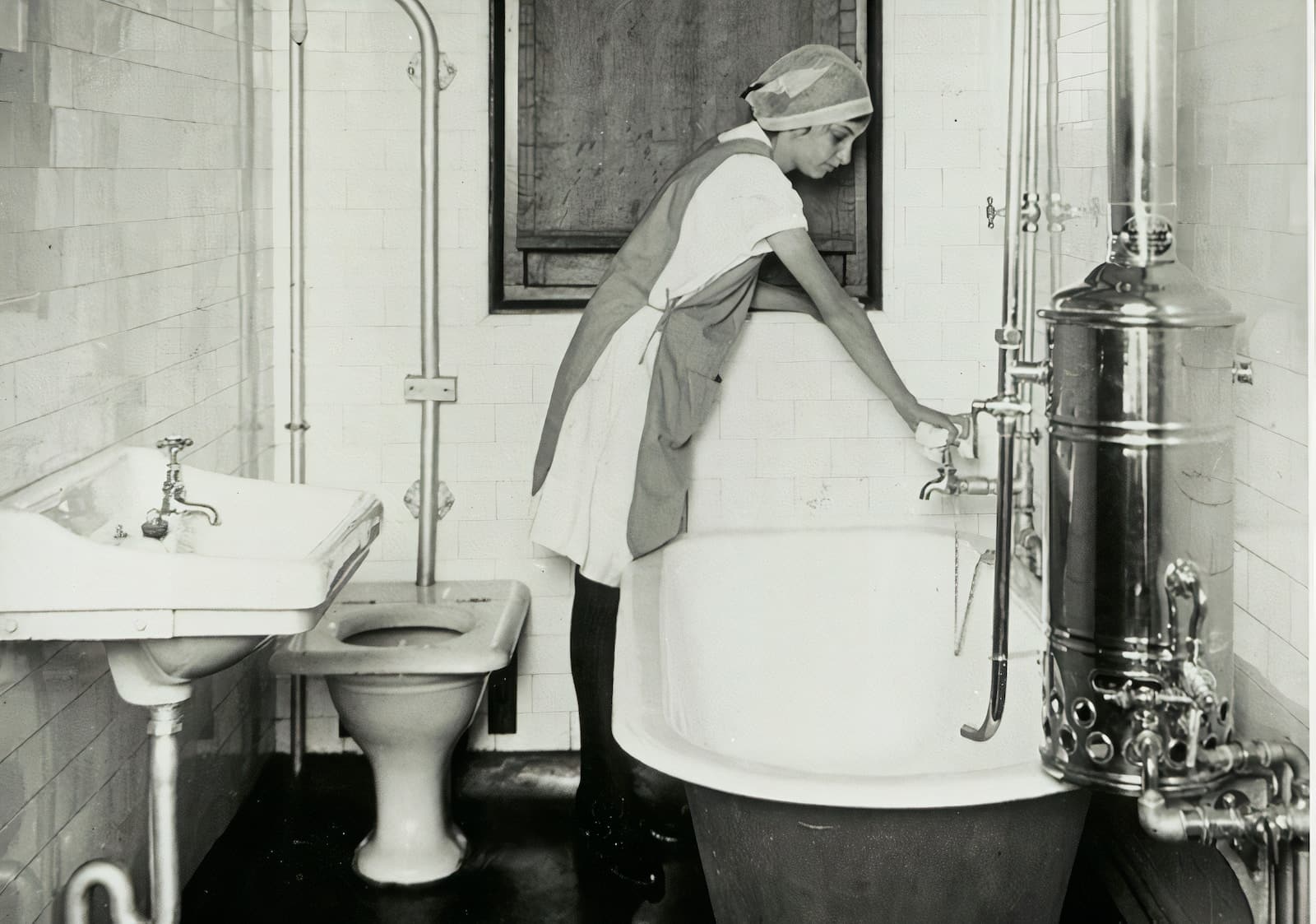 a black and white photo of a woman in a bathroom